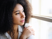 Woman looking out a window